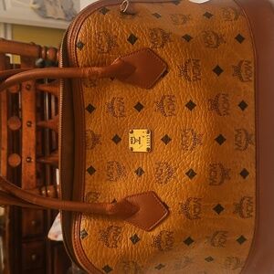 Vintage MCM bag with cross body strap and coa.
